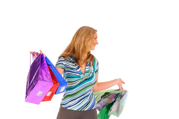 Mujer rubia con bolsas de compras —  Fotos de Stock