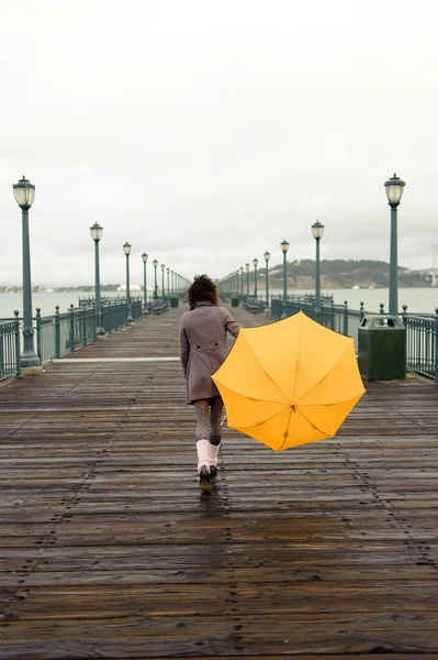 Young african woman with umbrella — Stock Photo, Image