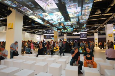 Visitors on Photokina Exhibition interior clipart