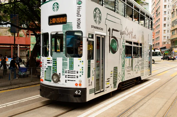 Double-decker tram with starbucks advertising