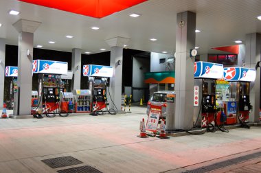 Fuel station at evening. clipart
