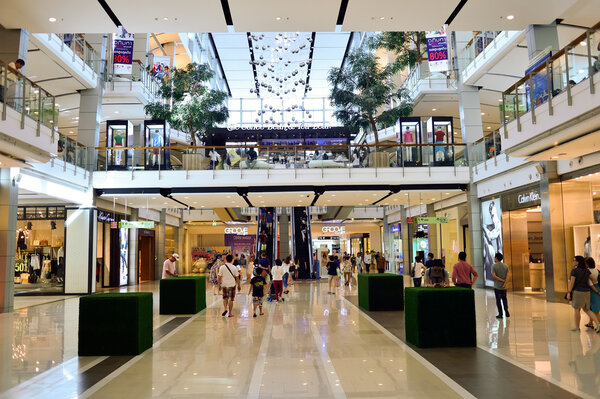 BANGKOK, THAILAND - JUNE 20, 2015: shopping center interior. Shopping malls and department stores such as Siam Paragon, Central World Plaza, Emperium, Gaysorn and Central Chidlom become shopping Mecca for shopaholics