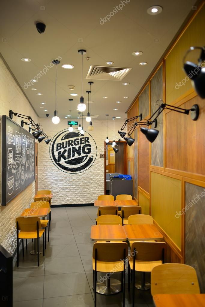 SHENZHEN, CHINA - AIPRIL 15, 2014 : interior of Burger King restaurant in Bao'an airport. Burger King, often abbreviated as BK, is a global chain of hamburger fast food restaurants