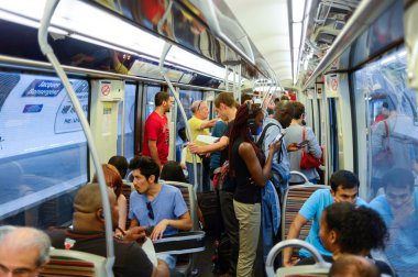 people in Paris Metropolitain train.