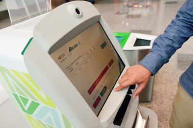 people use self check-in kiosk