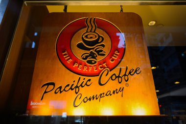 Pacific Coffee logo at night