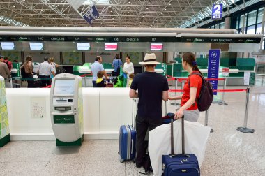 people use self check-in kiosks