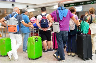 passengers on departure floor of Fiumicino Airport