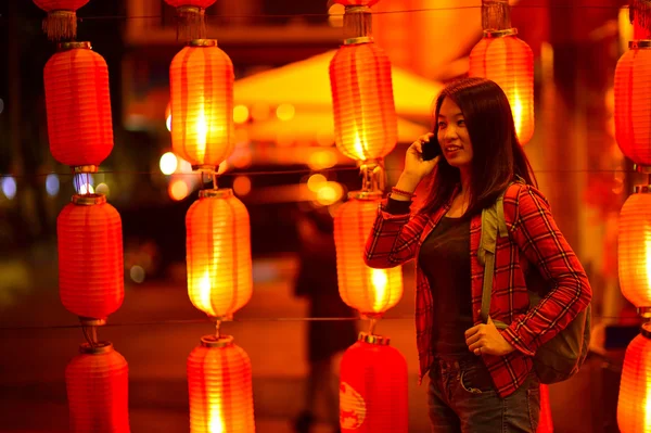 Chinese teenager with cell phone — Stock Photo, Image