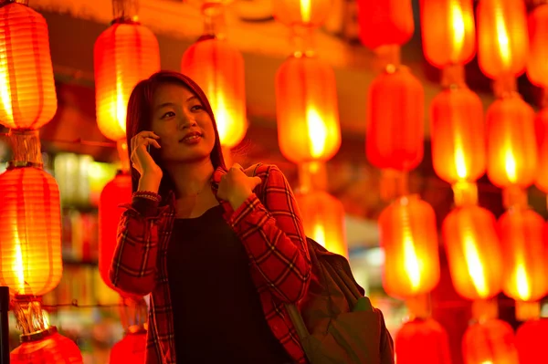 Chinese teenager with cell phone — Stock Photo, Image