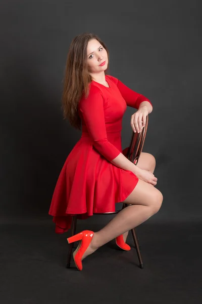 Girl in a red dress — Stock Photo, Image