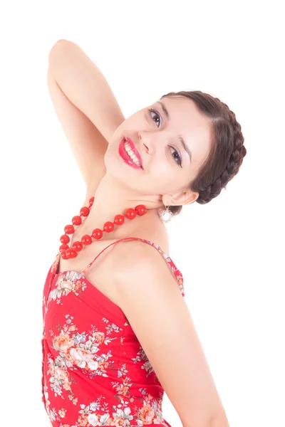 Lachende meisje in een rode jurk — Stockfoto