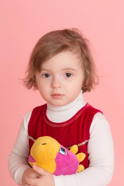 Girl with a toy — Stock Photo, Image