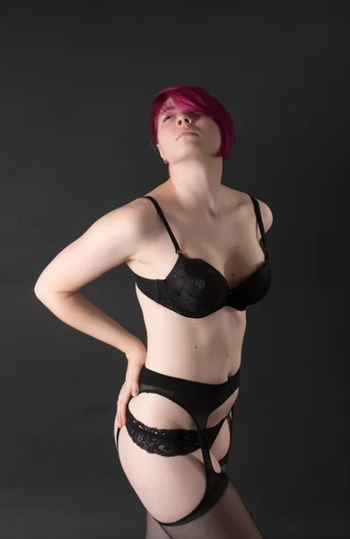 Meisje in zwarte lingerie — Stockfoto