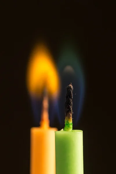 Candles on a black background — Stock Photo, Image