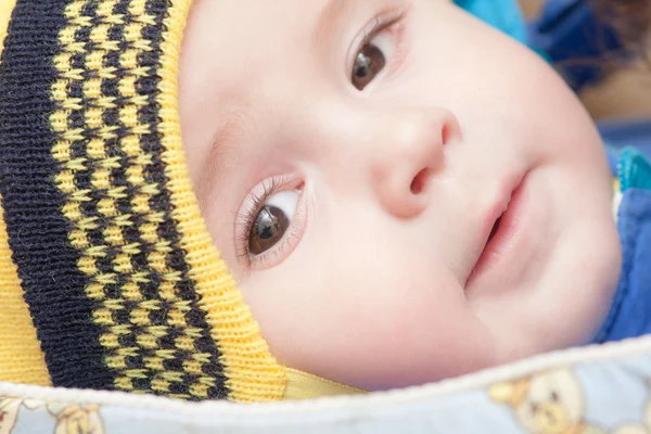 Baby with brown eyes Stock Picture