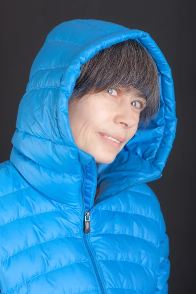 Woman in a blue jacket — Stock Photo, Image