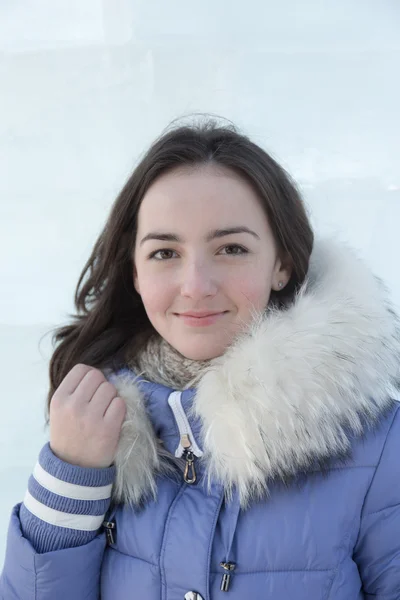 Girl in a blue jacket — Stock Photo, Image