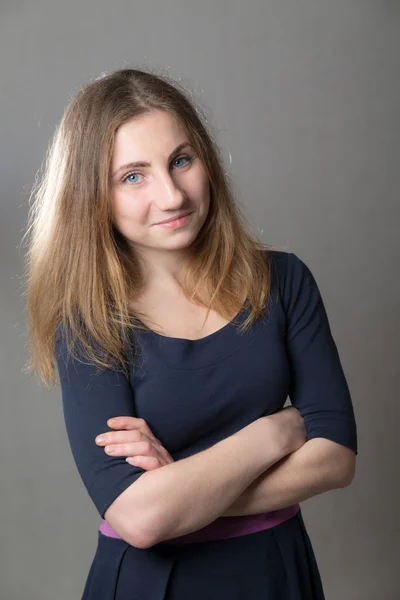 Girl on a gray background — Stock Photo, Image