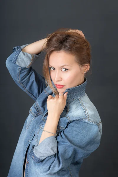 Sensuele meisje in denim jasje — Stockfoto