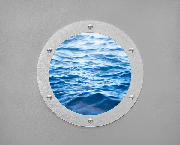 Round porthole and sea wave — Stock Photo, Image