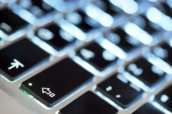 Computer keyboard illuminated close-up — Stock Photo, Image