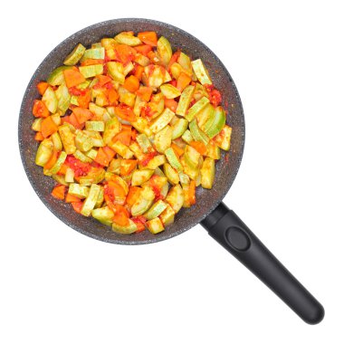 Sebze yahni. Kabak ve havuç bir tavada domates.