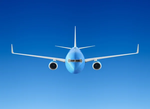 Passenger airplane flying in the blue sky — Stock Photo, Image