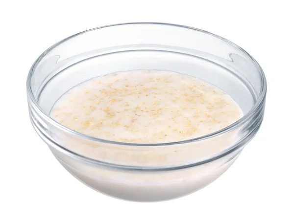 在白色背景上的玻璃碗燕麦粥 — 图库照片