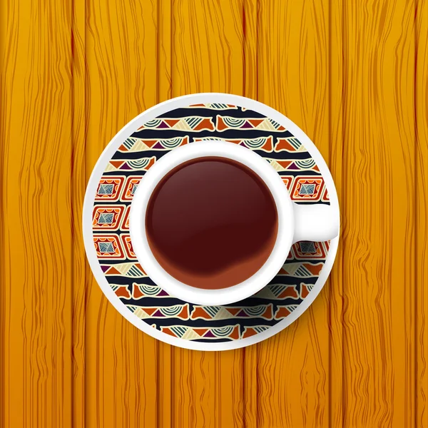 Una taza de café en un platillo con patrón tribal. Vector illustrati — Vector de stock