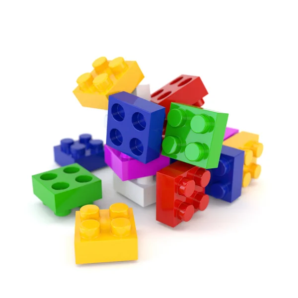 Conjunto de bloques de lego de plástico multicolor aislados en una espalda blanca — Foto de Stock