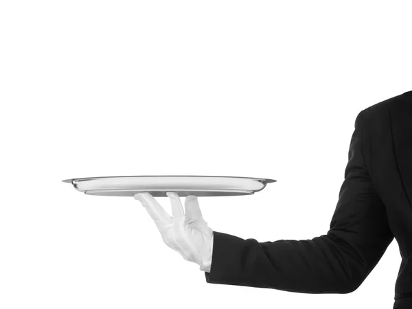 Hand of the waiter in white glove with silver dish on white back — Stock Photo, Image