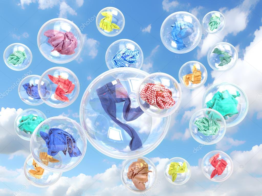 clothing in soap bubbles on sky background concept of washing