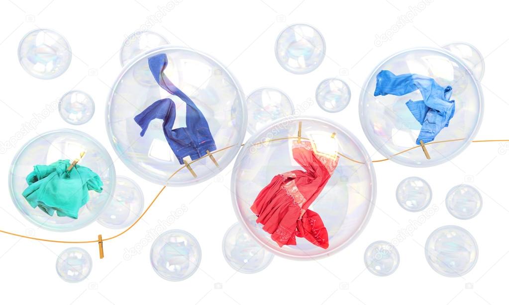 things falling in soap bubbles on a white background concept of 