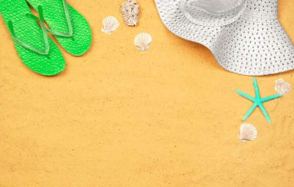 Few summer items on sand — Stock Photo, Image