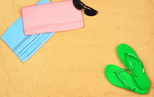 Few summer items on sand — Stock Photo, Image
