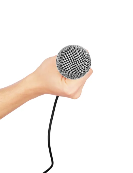 Mão com um microfone isolado em branco — Fotografia de Stock