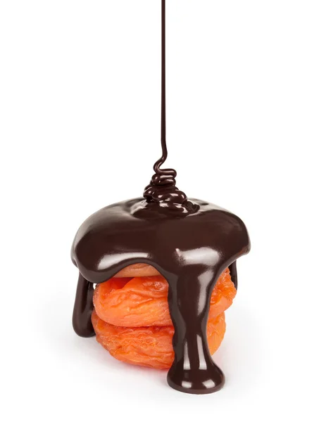 Patak forró csokoládé egy halom kajszibarack elszigetelt fehér bac — Stock Fotó