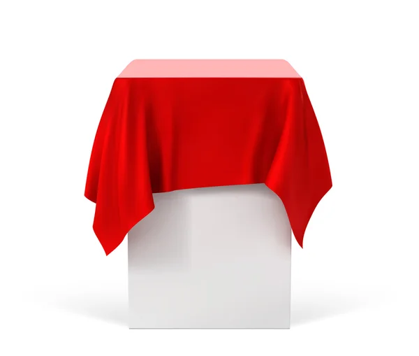 Paño rojo sobre un pedestal cuadrado aislado sobre blanco — Vector de stock