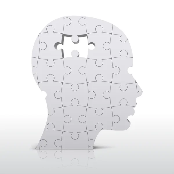 Human head build out of puzzle pieces — Stock Vector