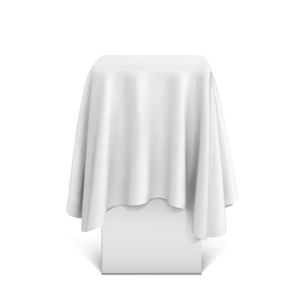 Pedestal de apresentação coberto com um pano branco — Vetor de Stock