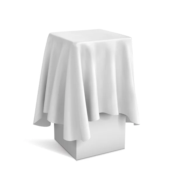 Pedestal de presentación cubierto con un paño blanco — Vector de stock