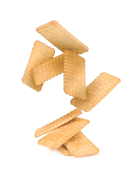 Crackers fall on the stack of square crackers isolated on white — Stock Photo, Image