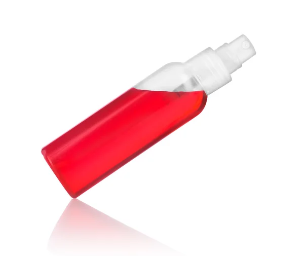 Láhev s rozprašovačem červené izolovaných na bílém pozadí — Stock fotografie