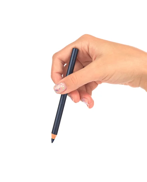Crayon cosmétique pour sourcils dans une main féminine isolée sur fond blanc — Photo