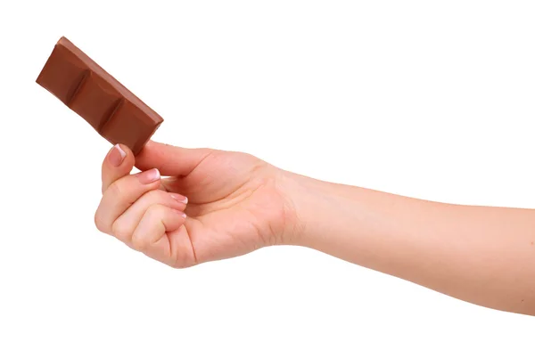 Una barra de chocolate en su mano chica aislada en blanco — Foto de Stock