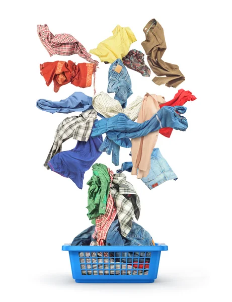 Clothes fall in to the basket isolated on white background — Stock Photo, Image