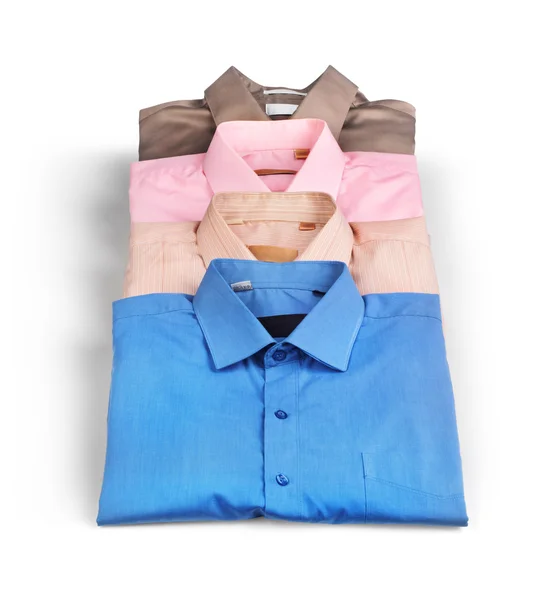 Stack of colored men's shirts isolated on white background — Stock Photo, Image