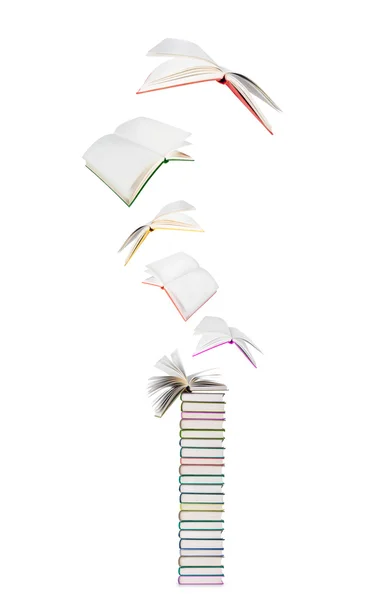 Летающие книги изолированы на белом фоне — стоковое фото