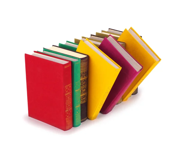 Books standing in a row on white — Stock Photo, Image